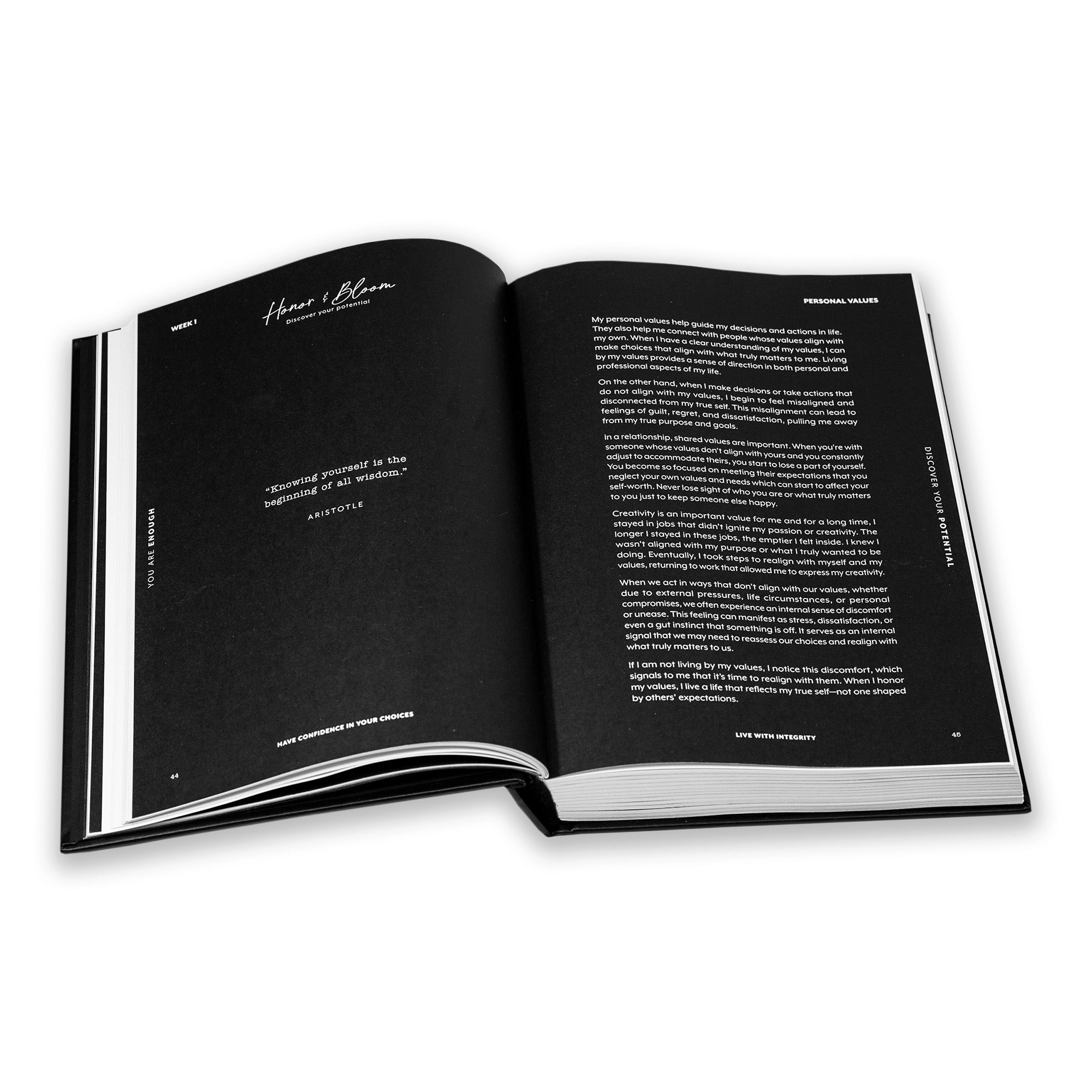 Open guided journal personal values pages with black pages on a white background