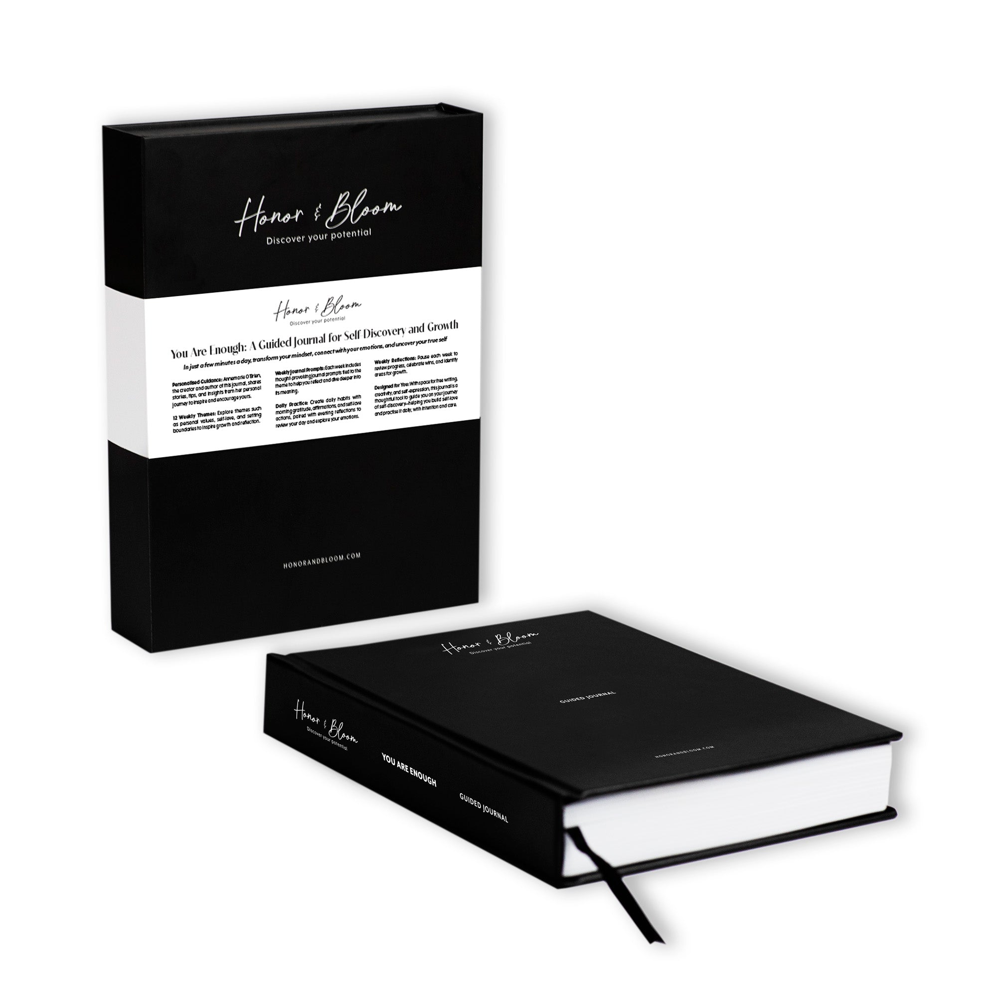 Black journal with white interior and black packaging on a white background