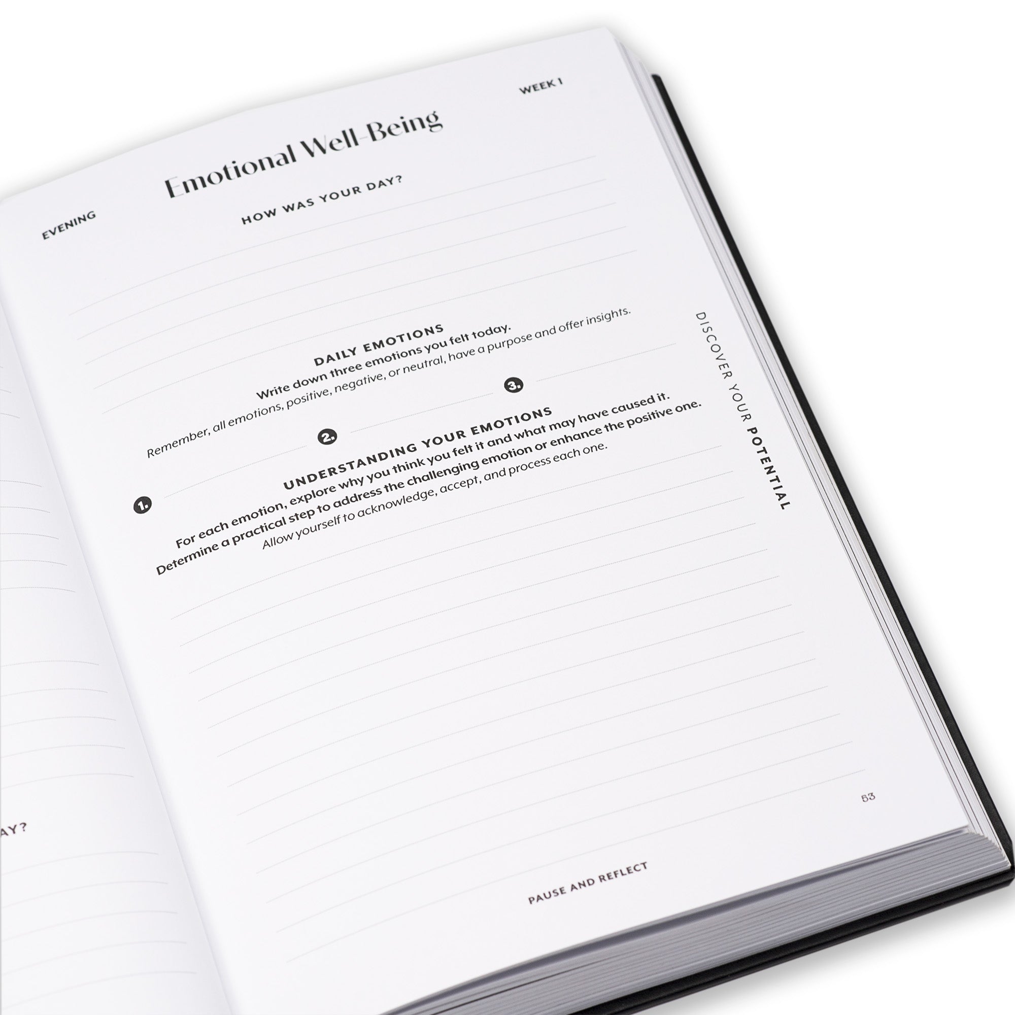 Open guided journal with emotional well-being journaling prompts on a white background