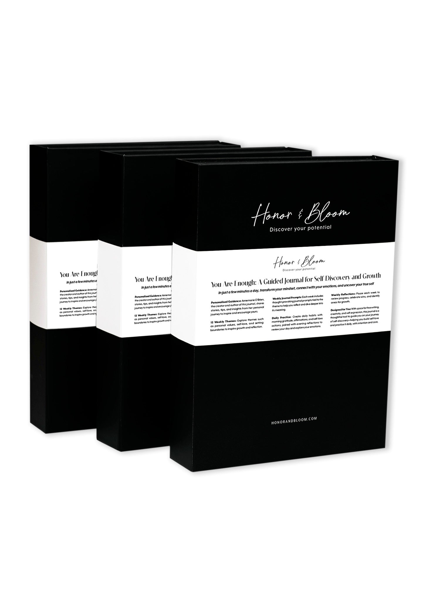 Three black gift boxes with 'Honor & Bloom' branding on a white background